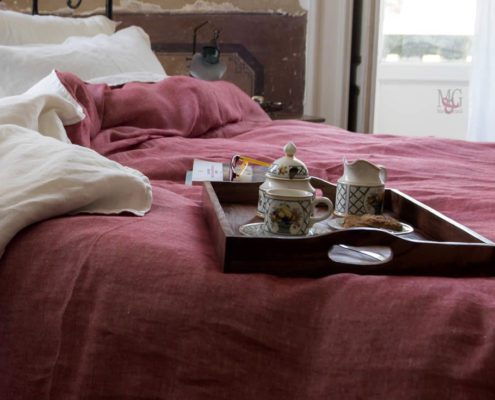 copripiumino matrimoniale rosso melograno per una prima colazione romantica