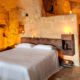 I SASSI DI MATERA ….. UN LETTO IN GROTTA