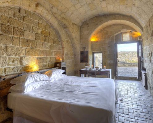 stanza da letto classic in grotta 28 i Sassi di matera stanza da letto classic in grotta 28 i Sassi di matera