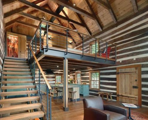architettura eclettica soppalco scala con tanto legno e ferro